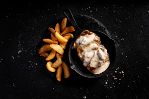 Фото Медальоны из свинины с грибным соусом